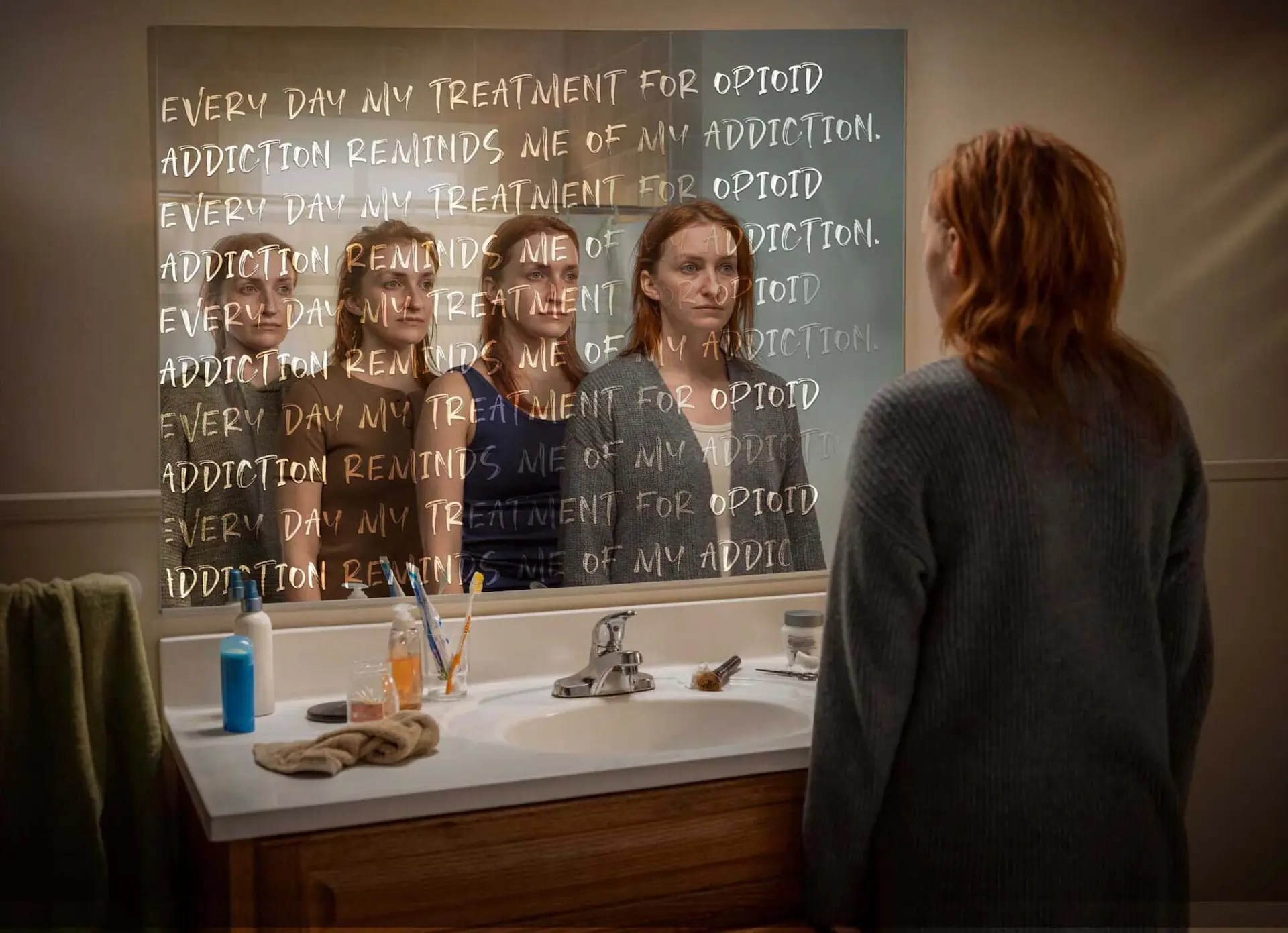 Woman stands in front of mirror repeating her everyday routine